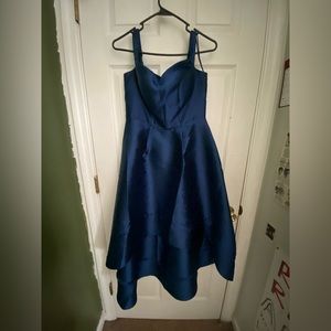 This dress has only been worn once